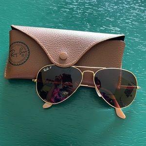 Raybans for any season. Dark maroon color